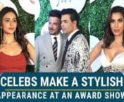 Rakul Preet Singh arrived at an award show in a stunning yet simple red dress with a thigh-high slit. Karan Johar and Anil Kapoor also attended the event in monochrome suits. Sophie Choudry looked stunning in a white gown with silver details and silver stilettos. Ada Khan arrived at the event in a bronze-gold gown with boxing gloves. Sonali Bendre looked stunning in a golden wrap dress. Sonu Sood also arrived in an all-black outfit.