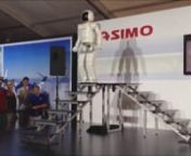 A 2012 demonstration of ASIMO (Advanced Step in Innovative MObility), a humanoid mobility-assistance robot designed and developed by the Japanese company, Honda. It is 130 cm (4 ft 3 inches) tall and is intended to one day support people who have walking difficulties.