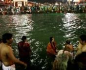 People at the Kumba Mela in Haridwar taking a bath in the holy river of Ganga.