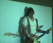 Curt Cloninger performs a four-hour, time-shifted duet with his mediated self. Looped video/audio of him singing and playing guitar is projected on top of his live body singing and playing guitar. Both blindfolded. Call and response.nnThey loop the chorus of the pop song