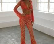 Feathers and sheer details make this sexy two-piece set perfect for the fashionista who&#39;s not afraid to steal the spotlight. The No Rules jumpsuit features a long sleeve crop top with a plunge V-neckline, crisscrossing straps that wrap around the waist, and bandage pants with a diamond geometric pattern on the front. The sexy fit and bold look makes it ideal for any night out on the town.nnDry clean onlyn90% rayon, 9% nylon, 1% spandexnnhttps://indiexo.com/products/no-rules-red-sheer-mesh-feathe