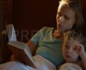 Get 100&#39;s of FREE Video Templates, Music, Footage and More at Motion Array: https://www.bit.ly/2UymF81nnnnGet this here: https://motionarray.com/stock-video/mother-and-son-reading-book-138522nnThis stock footage shows a young Caucasian mother with her little son reading a book while lying in bed. The mother is the one reading a story to her son. Use the clip as a supplemental footage in vlogs, documentaries, social media posts, movies, TV shows and other projects related to motherhood, parenting