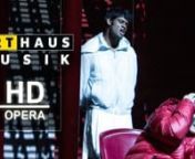 Get your DVD here &#62;&#62;&#62; https://AHM.lnk.to/BassaridsVDnn52 years after their premiere, Hans Werner Henze’s The Bassarids return, with Kent Nagano at the helm, to the Salzburg Festival for a rare revival of this modern classic in a highly dramatic psychological staging by Krzysztof Warlikowski. Aware of the story’s up-to-dateness, the director showcases the stark contrast between Dionysus, who preaches intoxicating excesses and sensuality, and his cousin King Pentheus, who leads a life marked b