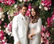 King Khan with his Queen Gauri Khan looks extravagant dipped in royalty for the Big wedding #Throwback SRK with his wife were ethereal in shades of white and grey. The actor wore a white bandhgala pathani suit which he teamed-up with a two-layered pearl necklace. Gauri Khan’s sheer silver saree adorned with feather motifs on the border of her pallu is for the minimalistic who wishes to shine and stand out with less. While the colour of the sari was subdued, her choice of jewellery with a sleek