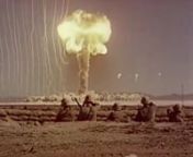 Atomic bomb test with soldiers exposed to nuclear blast and radiation. License this clip for &#36;40 from American Playback Images by calling 818-427-8292. Or email footage@Americanplayback.com. A-bomb explodes and blast wave hits troops in trenches. Soldiers emerge from trenches and walk towards the mushroom cloud. Circa 1950s.