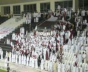 The National Anthem of Qatar is sung by a football crowd prior to a World Cup Qualifying match against Bahrain.