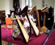 Two of the Isle of Man&#39;s leading young harpists perform &#39;Looking at a rainbow through a dirty window,&#39; one of the most-popular tunes for harpists in the Isle of Man today.nnThe tune is by Calum Stewart, arranged by Rachel Hair.nIt is performed here by Arabella Ayen &amp; Lucy Gilmore, in St. John&#39;s Chapel on Tynwald Day, 2021.nnArabella and Lucy are two of the Isle of Man&#39;s leading young trad musicians today. They have performed widely at concerts and festivals all over the Isle of Man and beyon