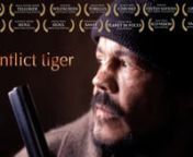 FILM WEB SITEnhttps://www.sashasnow.com/conflict-tigernnWATCH ON DEMANDnhttps://vimeo.com/ondemand/conflicttigernnIn the forests of the Russian Far East, an inexperienced and foolhardy poacher triggers an infamous series of tiger attacks on people.nnThe authorities call upon the services of Yuri Trush, a specialist in tracking and eliminating tigers that have lost their fear of man.nn‘Conflict Tiger’ takes Yuri’s most notorious pursuit of a ‘man-eating’ tiger as the basis for a documen