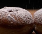 spreading-sugar-powder-on-hanukkah-jelly-doughnuts-2021-08-28-17-53-01-utc from utc