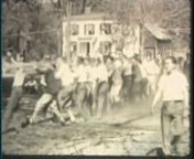 Mr. Boyden and students raze Dickinson Hall to make way for the present day Main School Building. This clip includes the installation of the bell on the new building. Shot on 16mm film from 1929-1931.