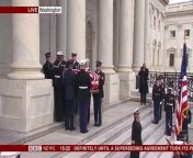 A military guard carried the former president&#39;s casket down the Capitol steps and placed it inside the hearse.