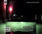 Dashcam video shows a Richmond, Texas police officer arriving at a train crossing and then pulling a woman to safety who had been sitting on the tracks.