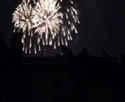 Innocently filming the 4th of July fireworks out of my NYC window when I noticed the couple on the rooftop next door.
