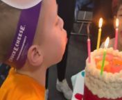 At this little boy&#39;s 7th birthday party, excitement crackled like static in the air as his eyes sparkled with wonder. &#60;br/&#62;&#60;br/&#62;Gathered around the Pokémon burn cake, his friends eagerly awaited the magic promised by his mother.&#60;br/&#62;&#60;br/&#62;With a kitchen stove lighter in hand, she delicately removed the upper layer of the cake, revealing not just one but two more layers beneath. Each layer was a canvas of enchantment, depicting different modes of Charmander.&#60;br/&#62;&#60;br/&#62;As the layers were unveiled, the room echoed with gasps of amazement and joy.  With each layer, his love for Charmander was reaffirmed.&#60;br/&#62;Location: Whitby, Canada &#60;br/&#62;WooGlobe Ref : WGA114751&#60;br/&#62;For licensing and to use this video, please email licensing@wooglobe.com