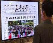 North Koreans read news in the Pyongyang Metro as the former propaganda chief Kim Ki Nam, credited with masterminding the personality cult surrounding the ruling Kim dynasty, died, with leader Kim Jong Un photographed bowing at his funeral bier.