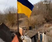 Ukrainian flag raised by soldiers after &#39;grey zone&#39; towns on border reclaimedState Border Service