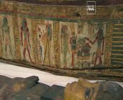 The ancient Egyptian sarcophagus, dating back over 3,000 years, is adorned with intricate hieroglyphs and vibrant polychrome paintings depicting the priestess of Amun, Ruru.