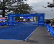 Australia&#39;s Luke Willian raises his arms in triumph after winning the elite men&#39;s race at the 2024 World Triathlon Cup in Wollongong on Saturday, April 20, 2024. Video by Josh Bartlett